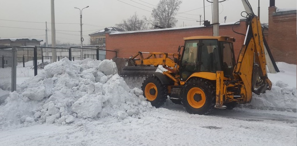 Экскаватор погрузчик для уборки снега и погрузки в самосвалы для вывоза в Вологодской области
